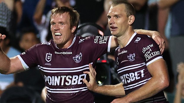 SYDNEY, AUSTRALIA - MARCH 16:  Tom Trbojevic (R) of the Sea Eagles celebrates with Jake Trbojevic of the Sea Eagles after scoring a try during the round three NRL match between Manly Sea Eagles and Parramatta Eels at 4 Pines Park on March 16, 2023 in Sydney, Australia. (Photo by Cameron Spencer/Getty Images)