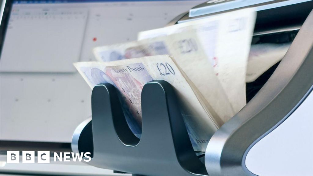 Three arrested after elderly woman tries to withdraw cash