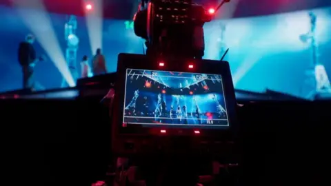 Intervision 2025 A photo of a camera filming the rehearsal for Intervision 2025