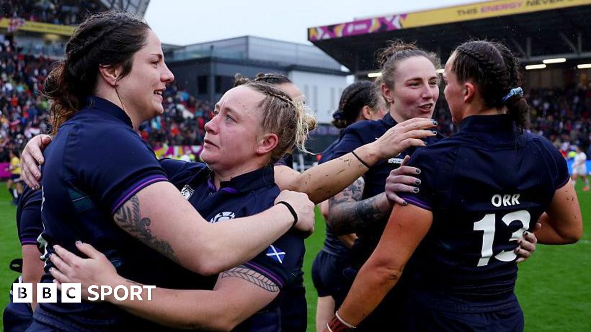 Scotland players embrace after defeat by England in Bristol