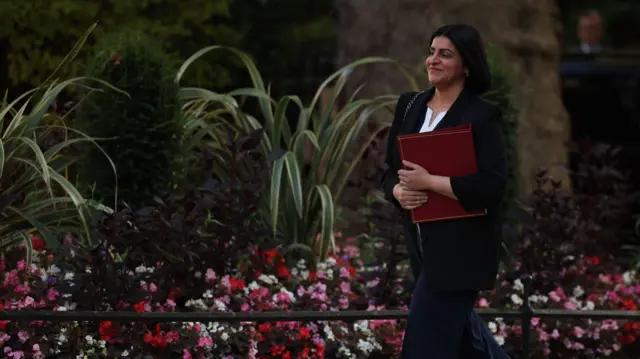 Shabana Mahmood walks with her red folder to a cabinet meeting