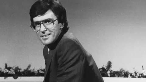 Getty Images Black and white image of a young John Stapleton 