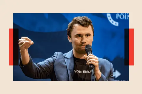 OLIVIER TOURON/AFP via Getty Images Charlie Kirk during a speech
