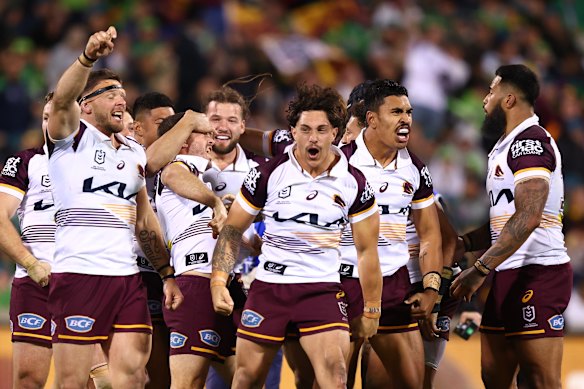 The Broncos celebrate victory.