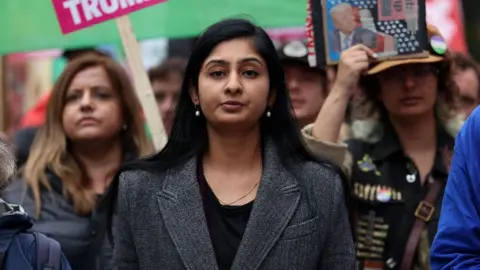 EPA/Shutterstock Zarah Sultana looking defiant at Stop Trump rally