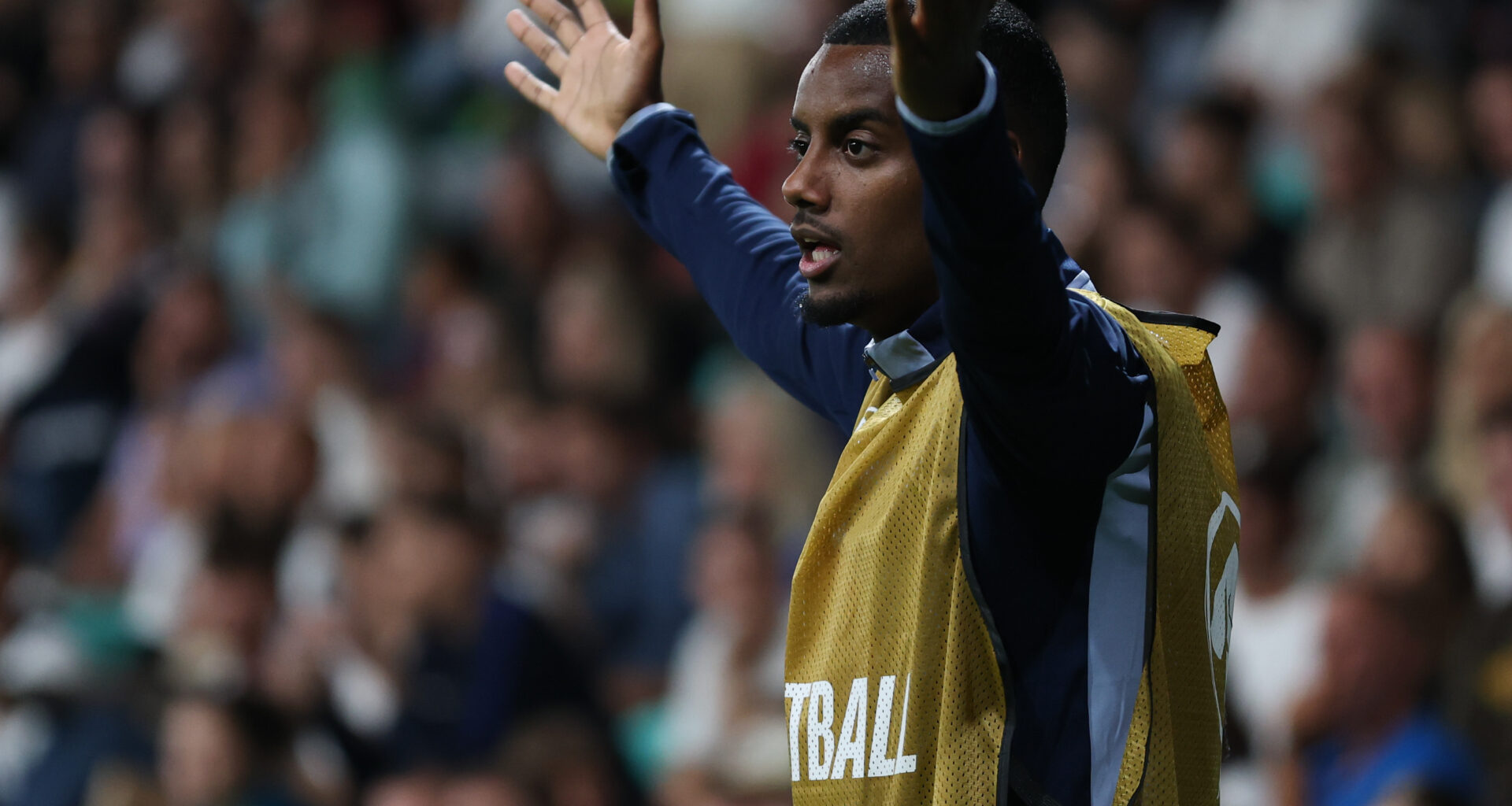 Alexander Isak warms up on the sideline as Sweden draw 2-2 with Slovakia