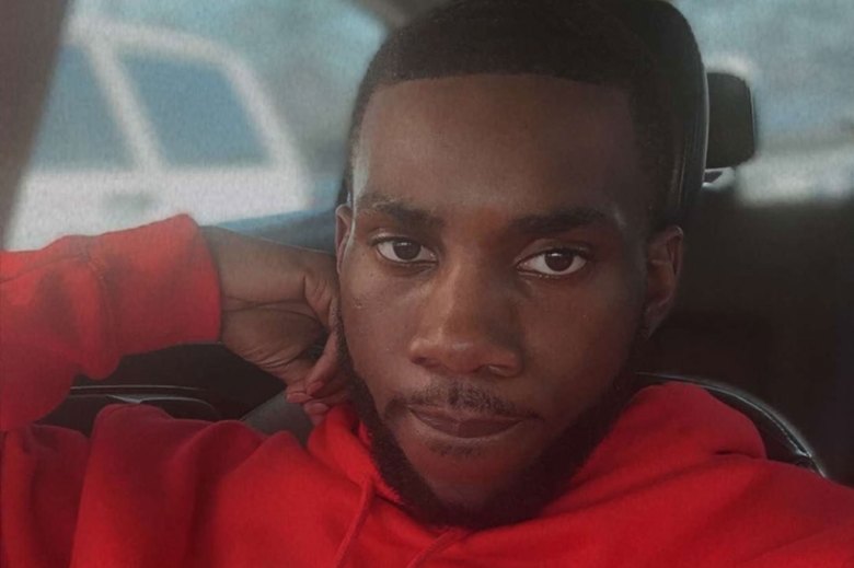 Demartravion Reed, seen in a car selfie wearing red