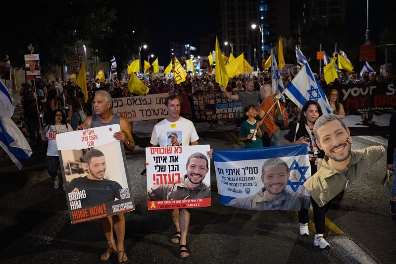 Ruby Chen (center), the father of hostage Itay Chen, leading a protest calling for the release of hostages near the Prime Minister's Residence in Jerusalem, August 23, 2025. (Yonatan Sindel/Flash90)