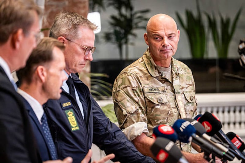 (L-R) Denmark's Defence Minister Troels Lund Poulsen, Denmark's Minister of Justice Peter Hummelgaard, Denmark's National Police Chief Thorkild Fogde and Denmark's Chief of Defence Michael Hyldgaard hold a press conference on the recent drone activities at several airports in Denmark, at the Ministry of Defence in Copenhagen on September 25, 2025. Drone flights that caused Danish airports to close on two nights this week were a systematic and hybrid operation by a "professional actor," the country's defence minister said. (Photo by Emil Nicolai Helms / Ritzau Scanpix / AFP) / Denmark OUT (Photo by EMIL NICOLAI HELMS/Ritzau Scanpix/AFP via Getty Images)          