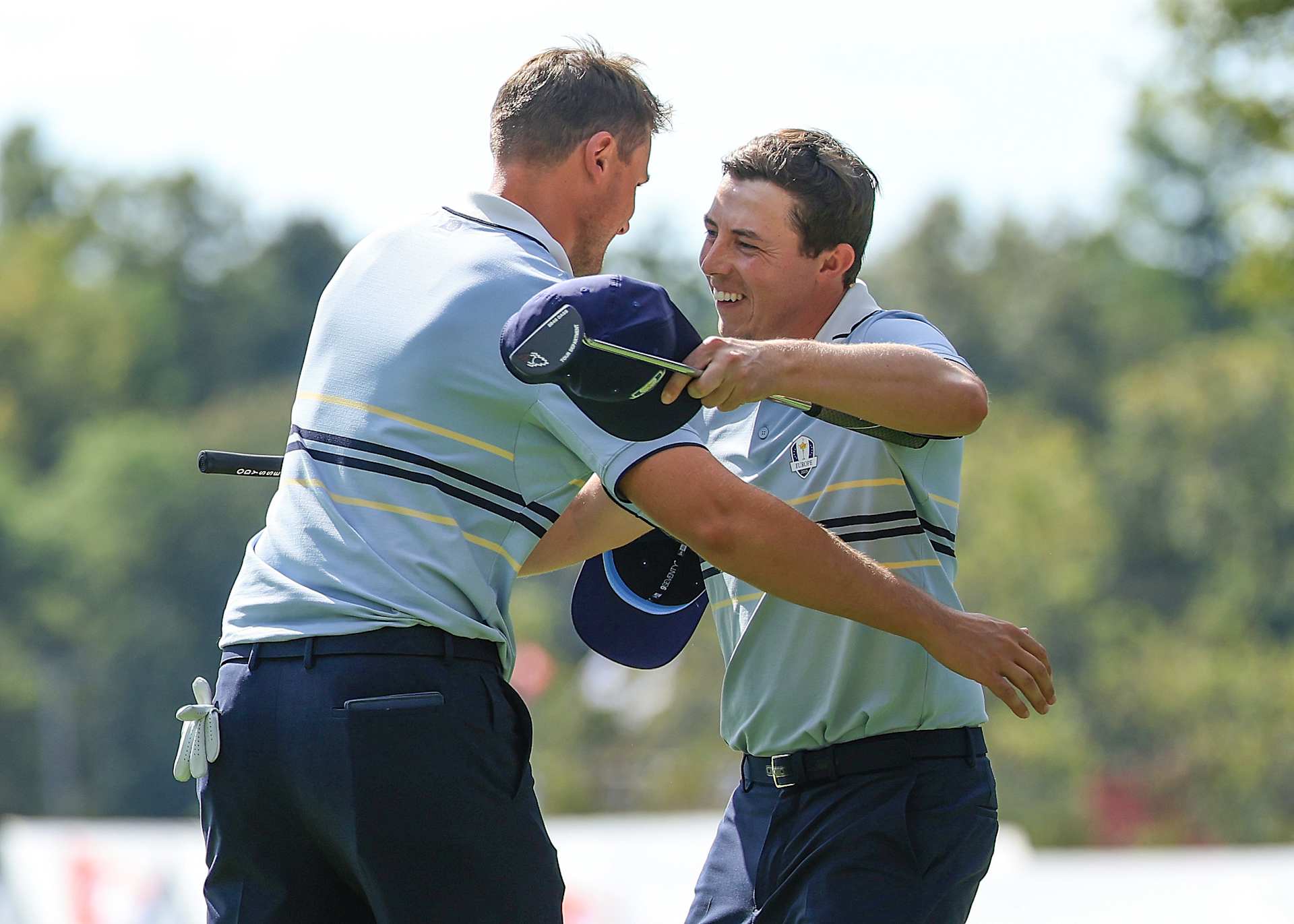 FARMINGDALE, NEW YORK - SEPTEMBER 26: Ludvig Aberg of Sweden and Matt Fitzpatrick of England and The European Team celebrate winning their match on the 15th green by 5&3 agianst Scottie Scheffler and Russell Henley during the Friday morning foursomes matches of the 2025 Ryder Cup at Black Course at Bethpage State Park Golf Course on September 26, 2025 in Farmingdale, New York. (Photo by David Cannon/Getty Images)