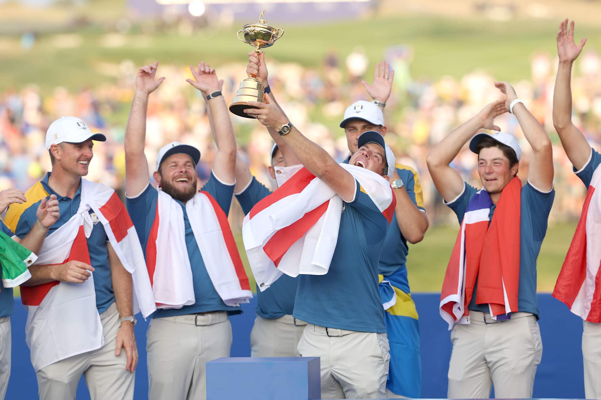 ROME, ITALY - OCTOBER 01: Rory McIlroy of Team Europe  lifts the Ryder Cup trophy following victory with 16 and a half to 11 and a half win following the Sunday singles matches of the 2023 Ryder Cup at Marco Simone Golf Club on October 01, 2023 in Rome, Italy. (Photo by Patrick Smith/Getty Images)