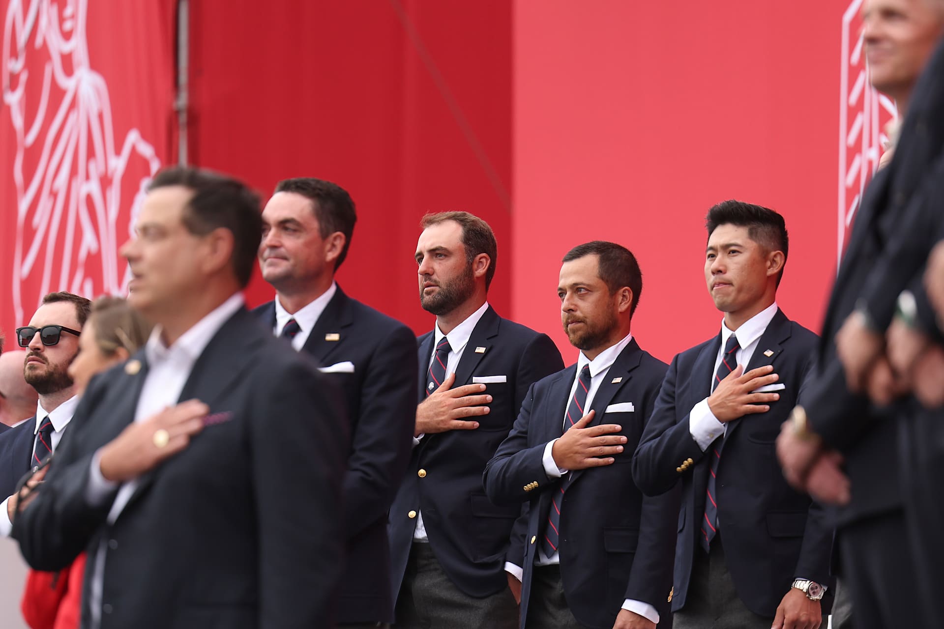 FARMINGDALE, NEW YORK - SEPTEMBER 24: Captain Keegan Bradley, Scottie Scheffler, Xander Schauffe, Collin Morikawa of Team United States stand during the national anthem during the opening ceremony for the 2025 Ryder Cup at Black Course at Bethpage State Park Golf Course on September 24, 2025 in Farmingdale, New York. (Photo by Andrew Redington/Getty Images)