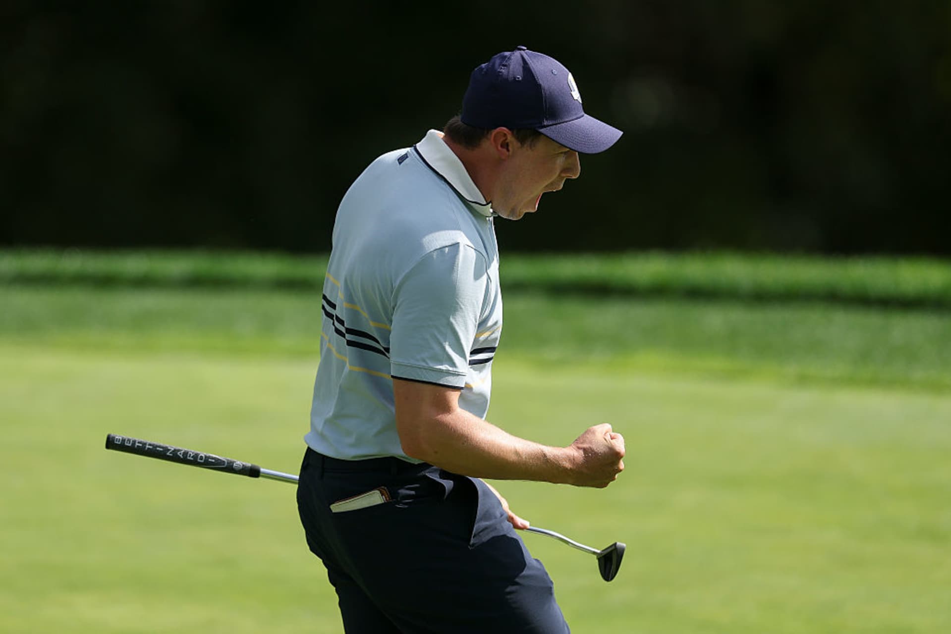 FARMINGDALE, NEW YORK - SEPTEMBER 26: Matt Fitzpatrick of Team Europe celebrates on the 15th green after defeating Russell Henley and Scottie Scheffler of Team United States 5&3 during the Friday morning foursomes matches of the 2025 Ryder Cup at Black Course at Bethpage State Park Golf Course on September 26, 2025 in Farmingdale, New York. (Photo by Carl Recine/Getty Images)