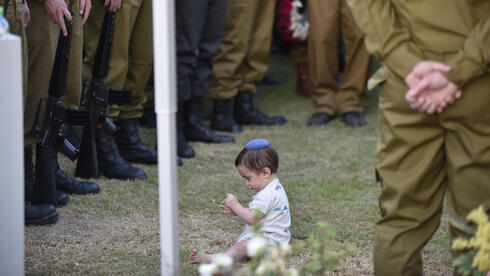 Heartbreaking farewell as infant son of IDF reservist killed in Gaza crawls on father