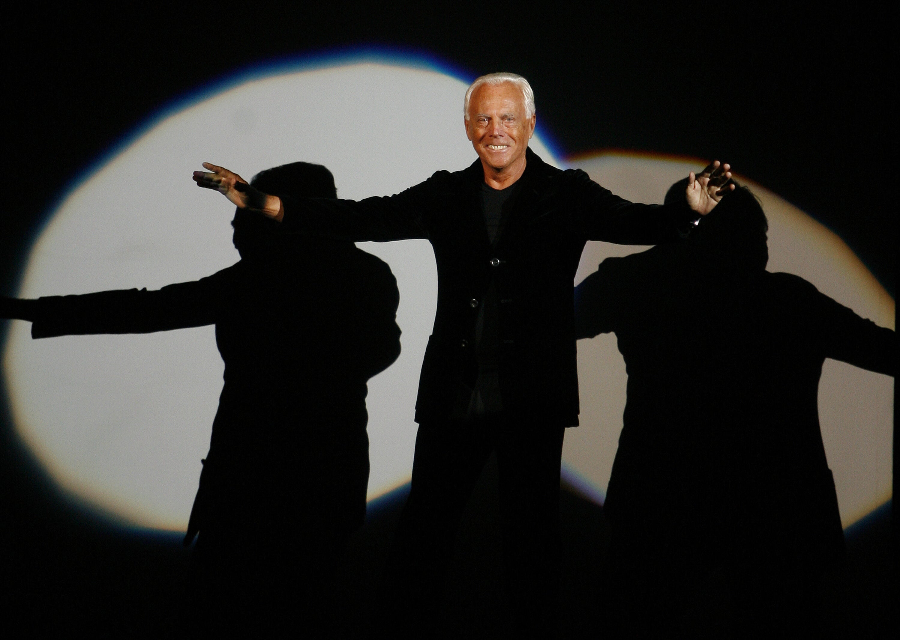 Giorgio Armani receives his share of applause after presenting his Emporio Fall-Winter 2007-2008 men's fashion collection
