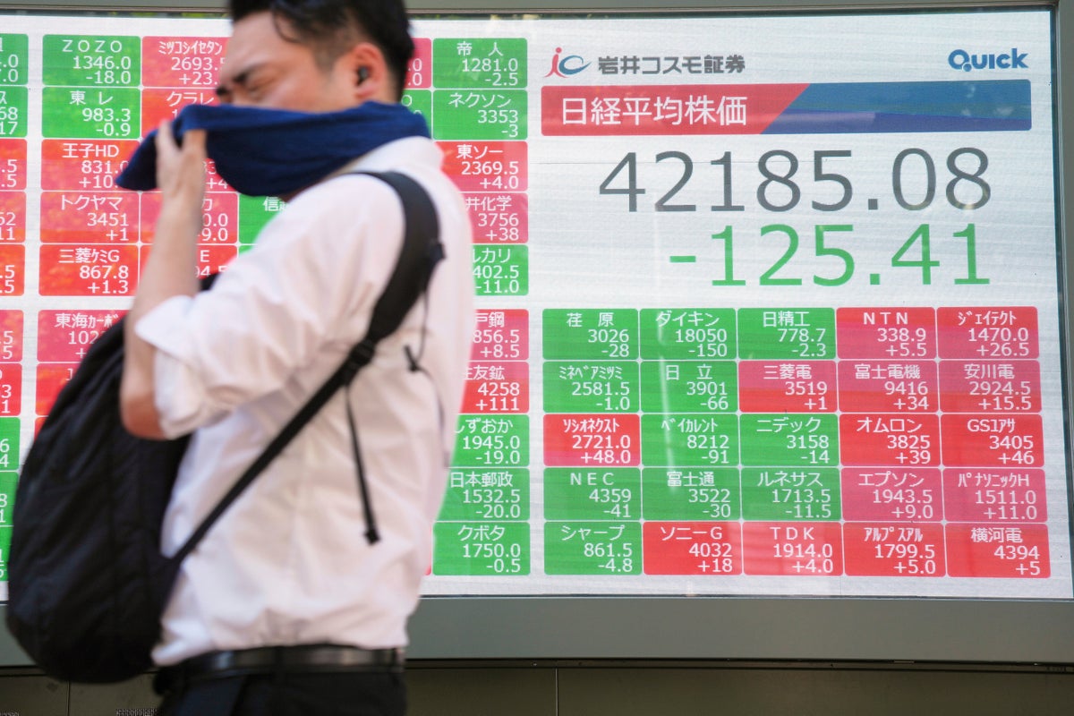 Asian benchmarks slip after US stocks sink and Japan faces political uncertainty
