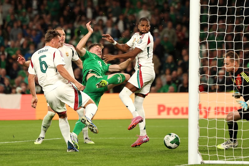 Evan Ferguson scores Ireland's first goal on Saturday, reducing Hungary's lead to 2-1. Photograph: Damien Eagers/PA Wire