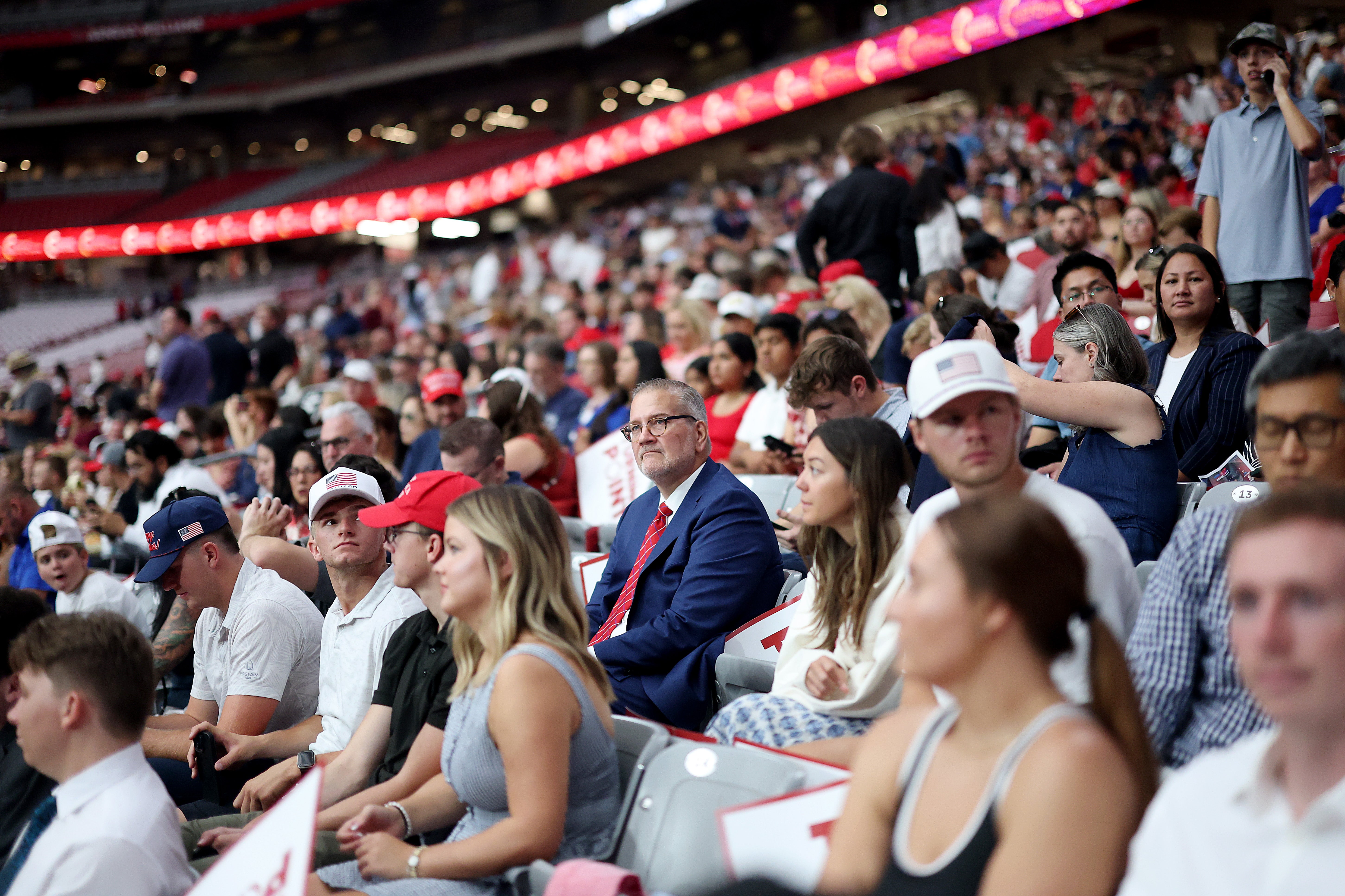 Attendees sit in the stands ahead of the memorial service for political activist Charlie Kirk at State Farm Stadium on September 21, 2025 in Glendale, Arizona