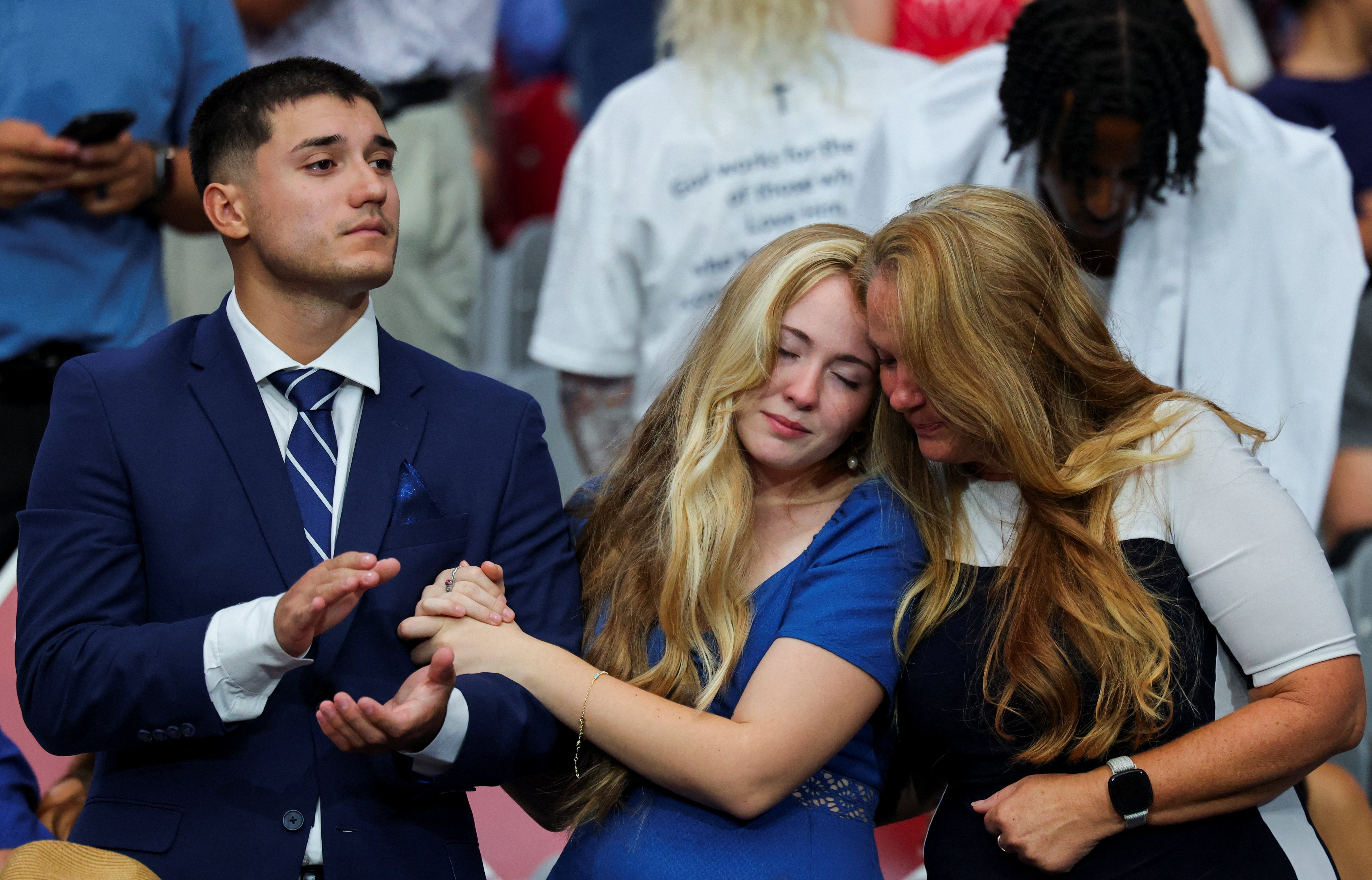 Pictures show the crowd looking emotional ahead of the service