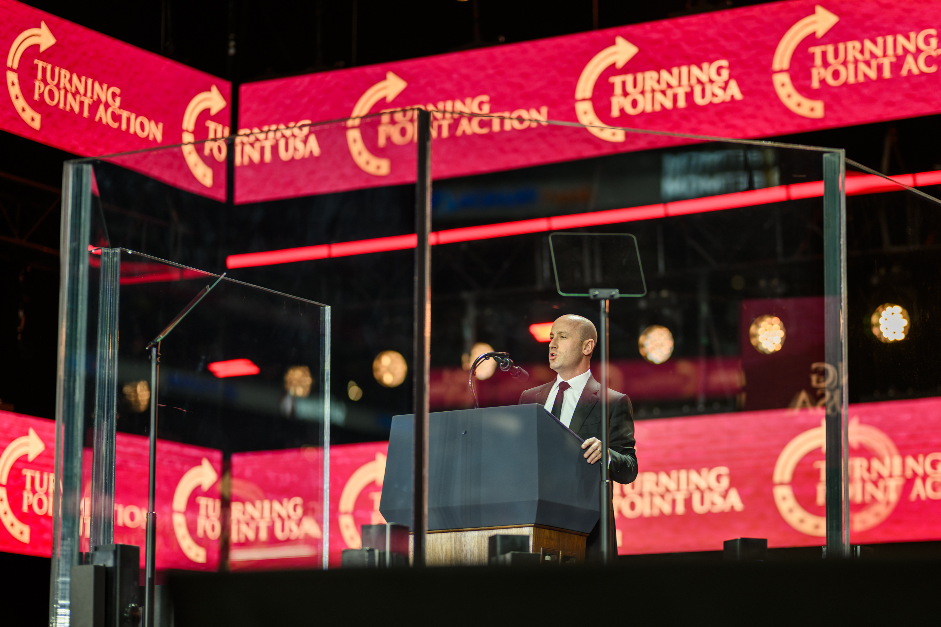 Deputy Chief of Staff Stephen Miller delivers remarks during the Memorial Service for Charlie Kirk at State Farm Stadium in Glendale, Arizona, Sunday, September 21, 2025.(Official White House Photo by Daniel Torok)