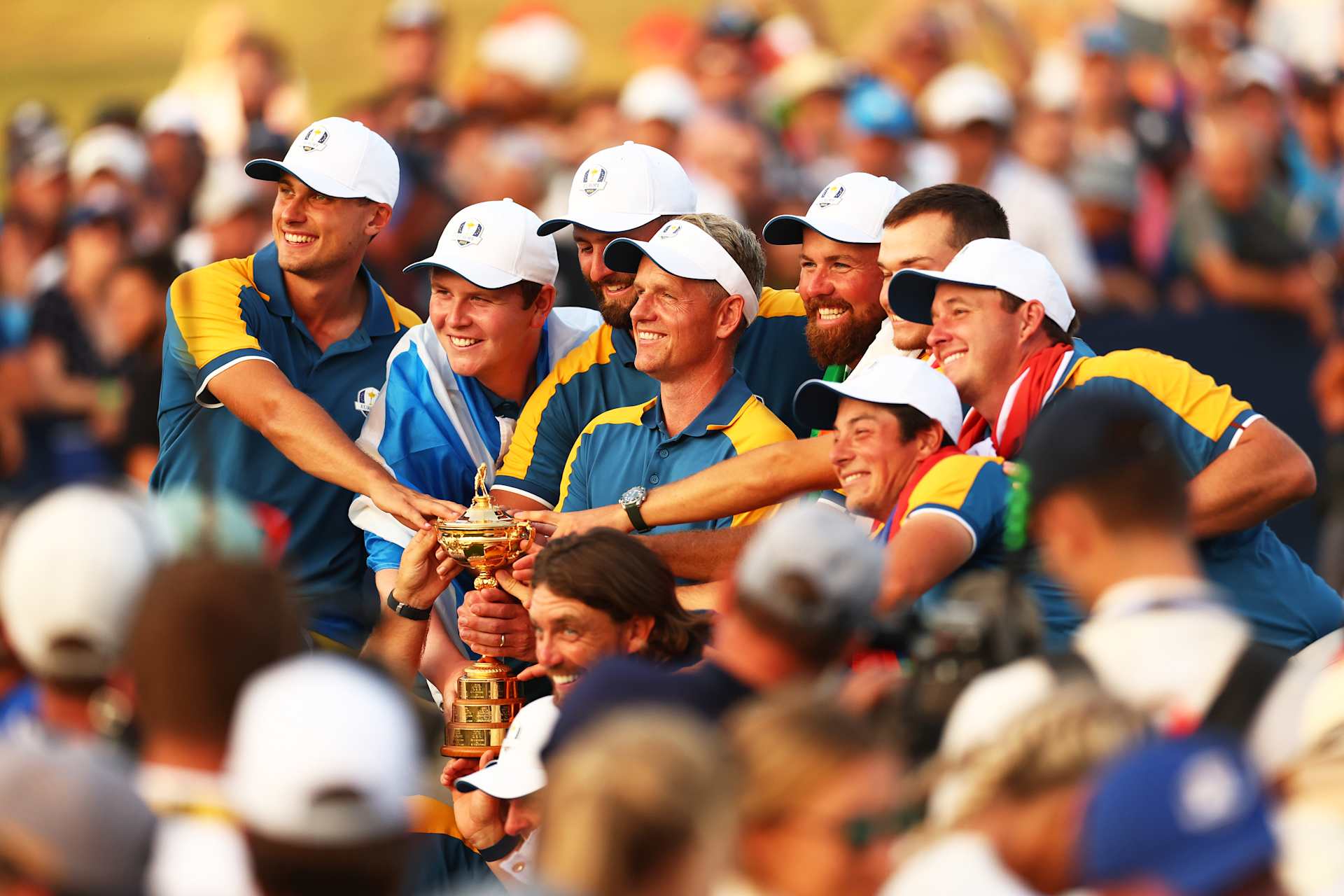 ROME, ITALY - OCTOBER 01: Team Europe Captain Luke Donald lifts the trophy with his team after his team win during the Sunday singles matches of the 2023 Ryder Cup at Marco Simone Golf Club on October 01, 2023 in Rome, Italy. (Photo by Naomi Baker/Getty Images)