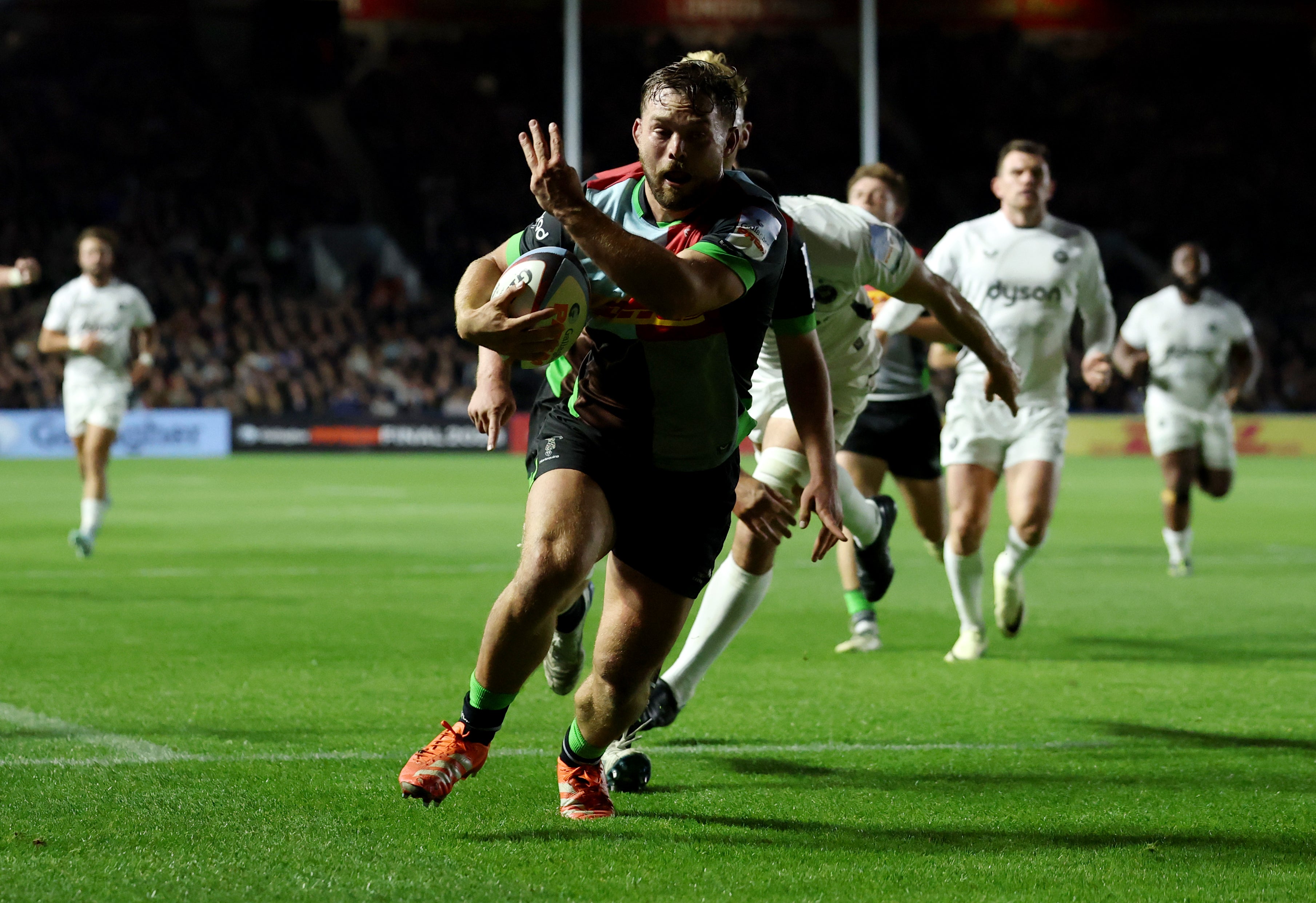 Will Evans scored a hat trick in the first half for Harlequins