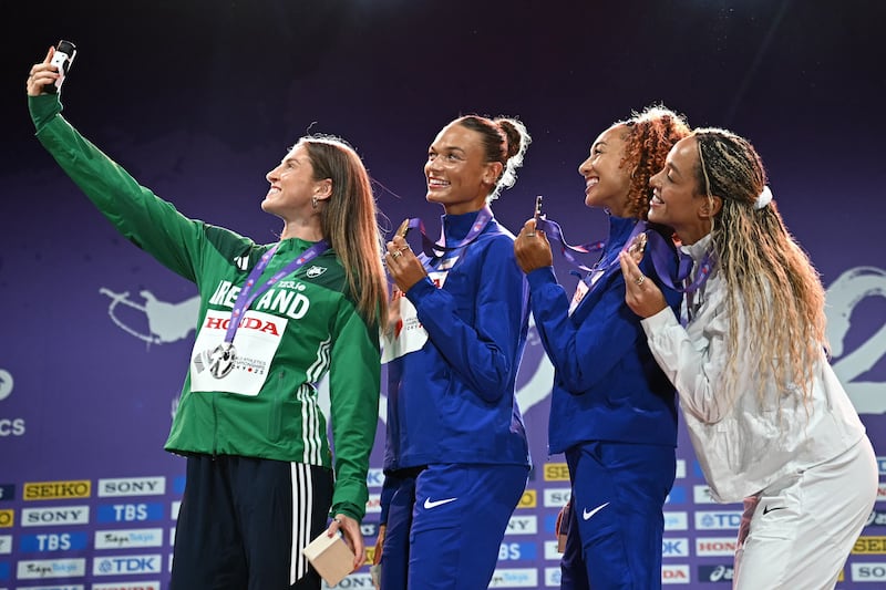 Silver medallist Kate O'Connor, gold medallist US athlete Anna Hall, and joint bronze medallists US athlete Taliyah Brooks and Britain's Katarina Johnson-Thompson on the podium. Photograph: Getty Images          