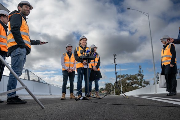 Victorian Premier Jacinta Allan at a level crossing removal project in July. The program is one of those alleged to have overseen wasteful spending.