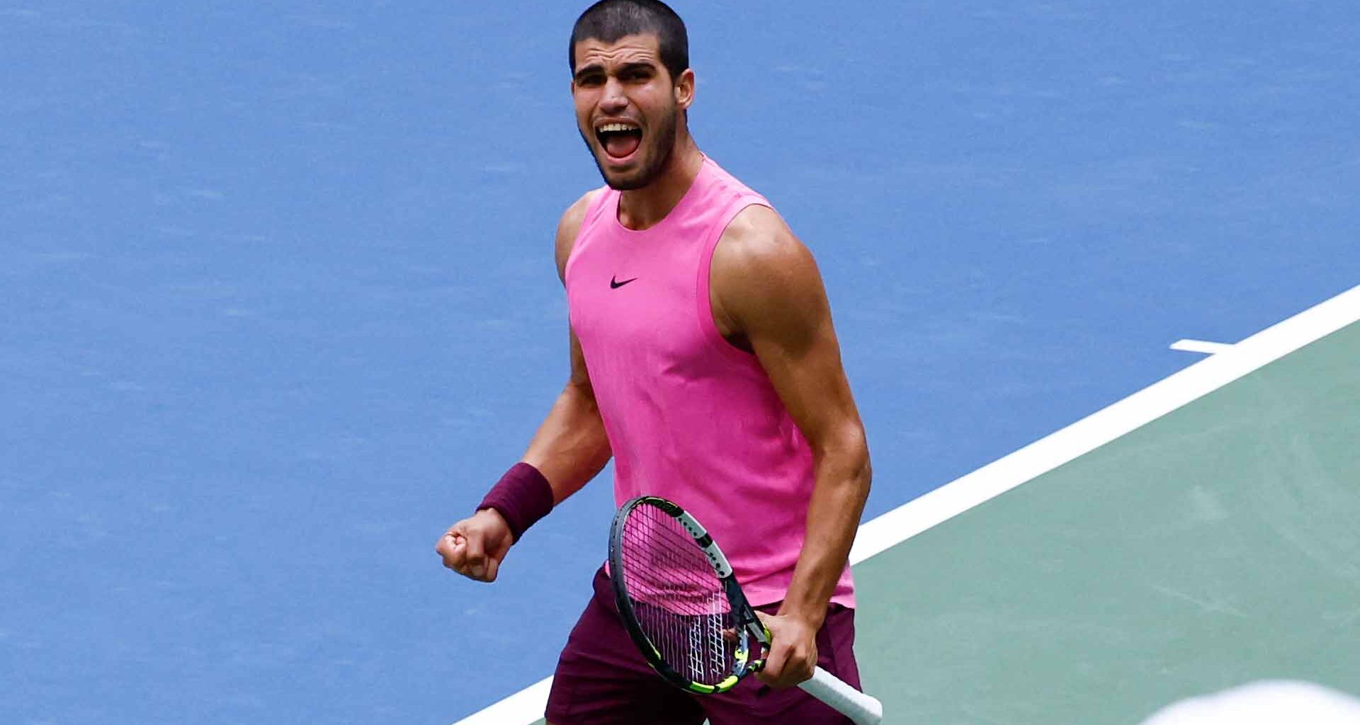 Carlos Alcaraz celebrates during a straight-sets win against Novak Djokovic Friday in New York.