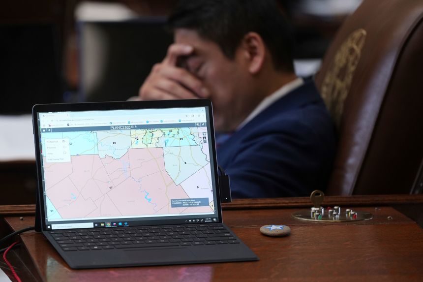 Texas state Rep. Gene Wu, D-Houson, sits through debate over a redrawn US congressional map in Texas during a special session, Wednesday, August 20, in Austin, Texas.
