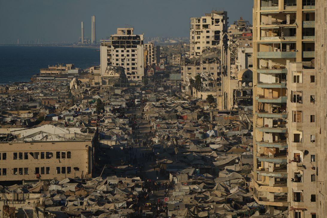 A makeshift tent camp for displaced Palestinians stretches across an area near the Gaza City port on Monday.