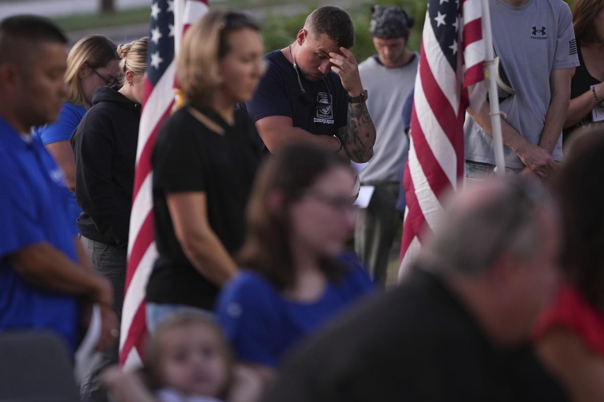 Slain US police officers shot by suspected stalker