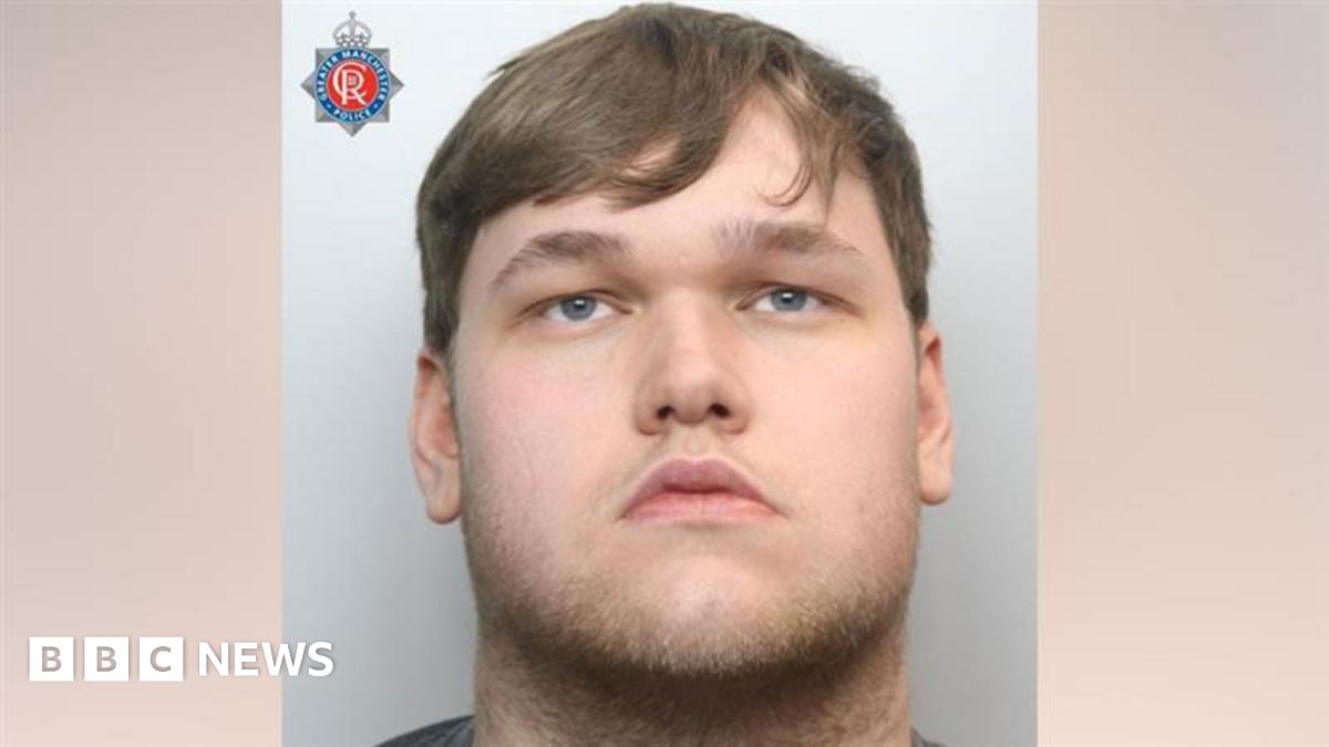 A police mugshot of Stuart Latham, 22. He has light brown hair, light stubble and blue eyes, and stares into the camera with a blank expression.
