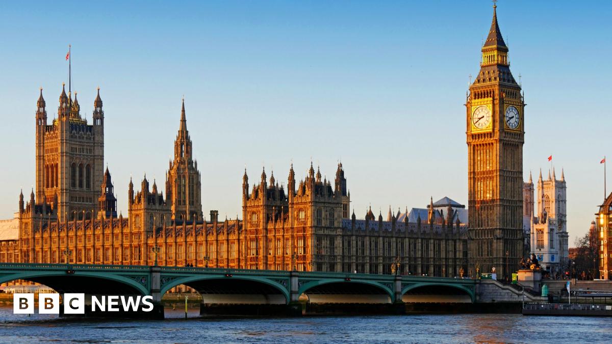 A photo of the Houses of Parliament and the Elizabeth Tower. Westminster Bridge and the River Thames are also visible.