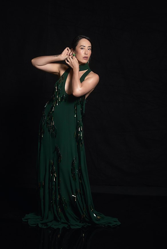 Alémais “Ophira” gown, Ryan Storer earrings.