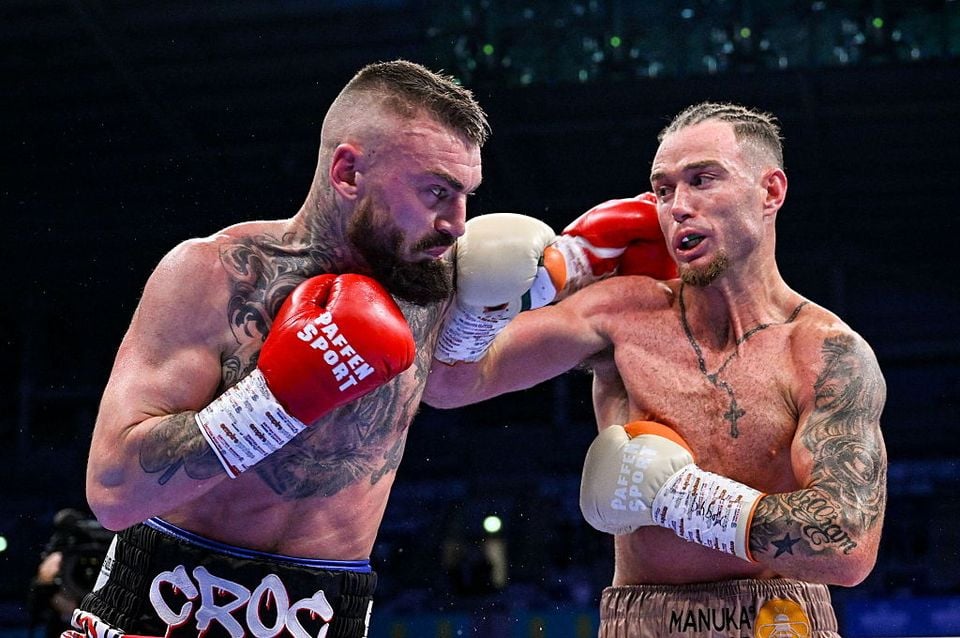 Lewis Crocker (left) and Paddy Donovan during their IBF World Welterweight title bout (Photo By Ramsey Cardy/Sportsfile via Getty Images)