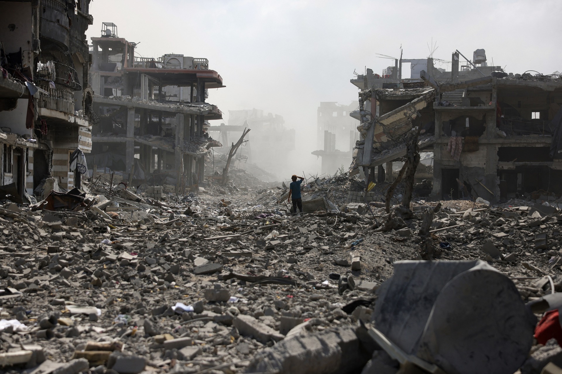 A street strewn with rubble following an explosion in the Saftawi neighbourhood, west of Jabalia in the northern Gaza Strip on August 25, 2025.