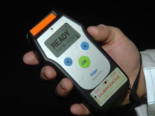 Checkpoint cop missed by a metre, police say