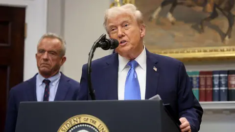 Getty Images Donald Trump and Health Secretary Robert F Kennedy Jr speak