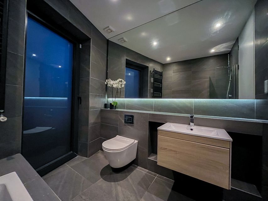 One of three bathrooms