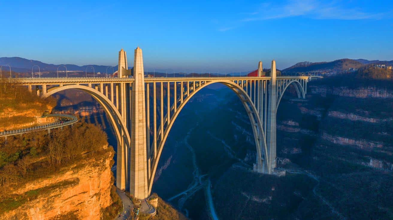 Illustration of the Huajiang Grand Canyon Bridge towering above the canyon floor in Guizhou Province, China.