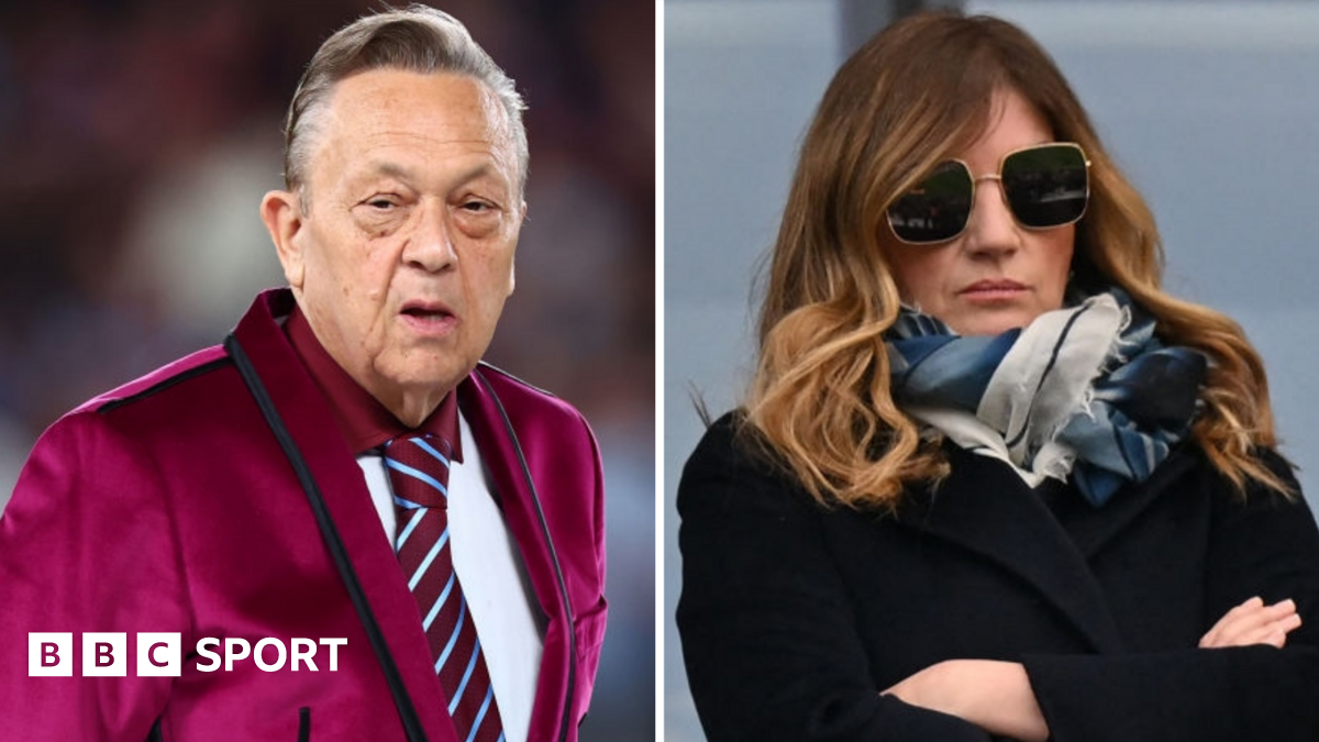 Protesters holding a banner that says "Sold our soul"