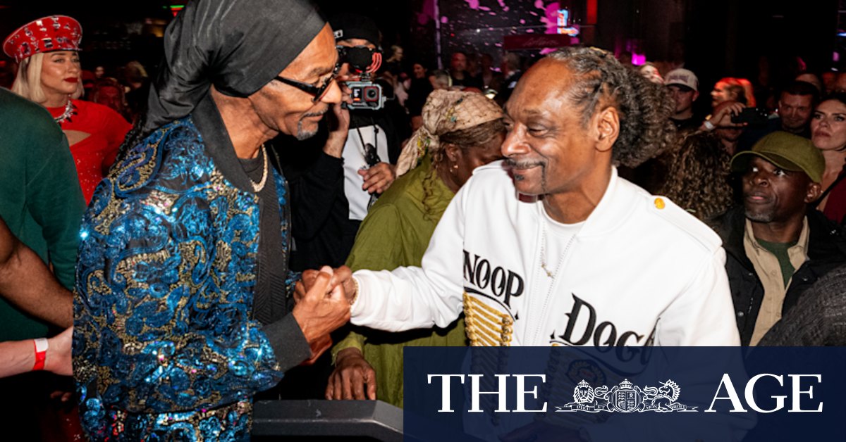 Snoop Dogg and lookalike doppelganger Eric Finch meet in Melbourne at AFL grand final after party