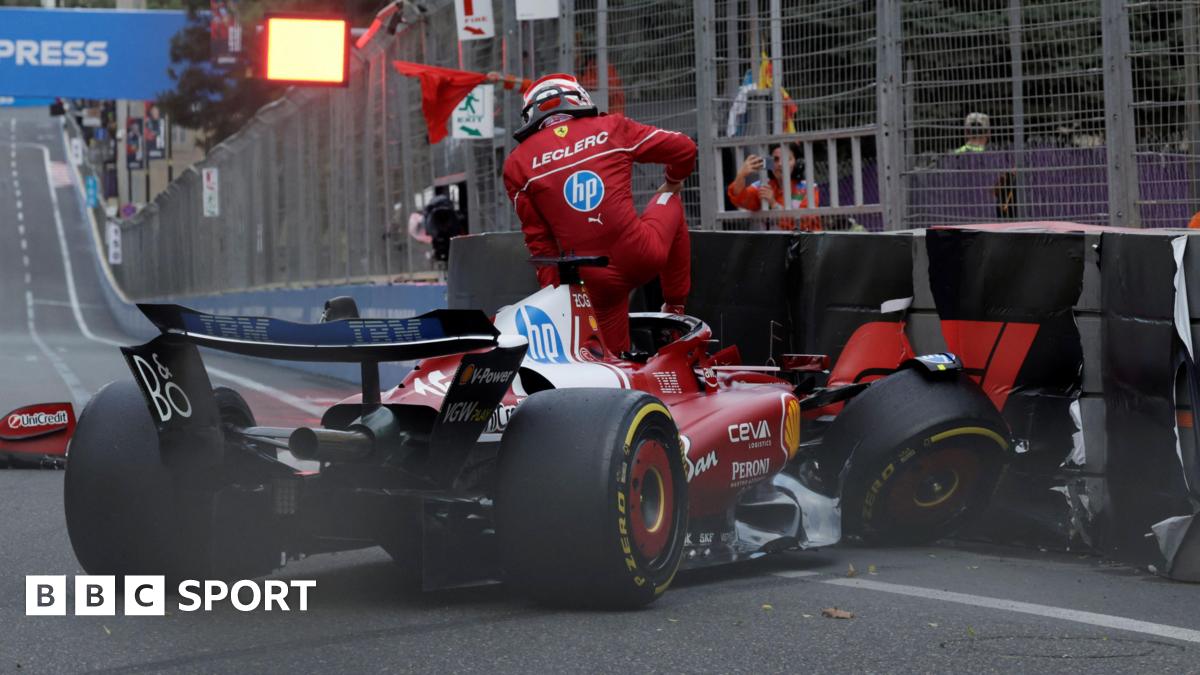 Ferrari's Charles Leclerc climbs out of his car after crashing into the barriers during qualifying for the Azerbaijan Grand Prix