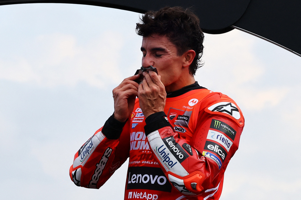 MotoGP - Japanese Grand Prix - Mobility Resort Motegi, Motegi, Japan - September 28, 2025 Ducati Lenovo Team's Marc Marquez celebrates on the podium after winning the 2025 MotoGP World Championship REUTERS/Kim Kyung-Hoon