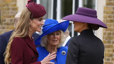 Getty Images (L-R) Catherine, Princess of Wales, Queen Camilla and First Lady Melania Trump arrive for a state visit at Windsor Castle
