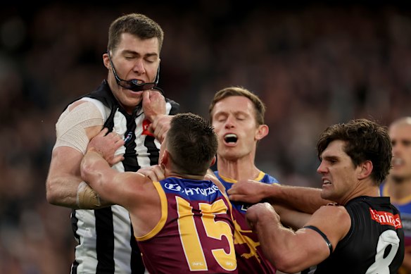 Dayne Zorko goes straight after the Pies’ biggest big man.