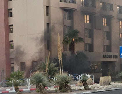Site of a drone hit in the yard of a hotel in Eilat, on Thursday.