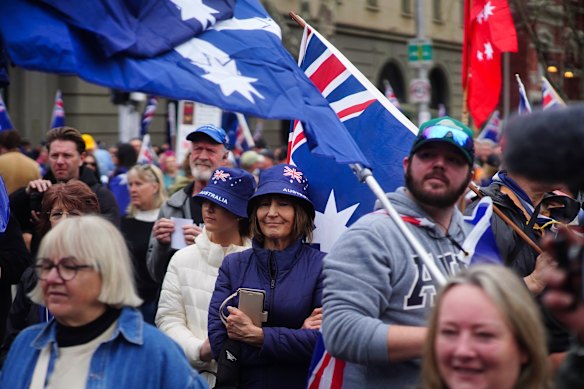 Protesters outside parliament waved the Australian flag and wore Australian flag-themed apparel.