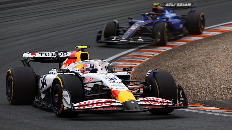 Liam Lawson of Racing Bulls and Carlos Sainz of Williams race in Zandvoort 